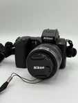 Nikon V2 Mirrorless Camera 30-110MM Lens 3.7X Zoom Built-in Flash Black. Fixed Price $239.99.