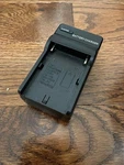 (used) Rohs Video/ Digital Camera Travel Charger 100V-240V 50/60HZ Dc 4.2V. Fixed Price $11.99.