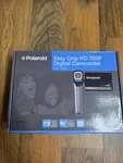 Polaroid DVG-720E Easy Grip Hd 720P Digital Camcorder Black With Spare Battery. Fixed Price $26.87.