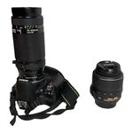 Nikon D60 Bundle: 2 Lenses, Battery And Charger, Travel Case, + More. Fixed Price $349.00.
