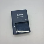 #d) Genuine Canon CB-2LX Battery Charger NB-5L Powershot S100 S110 SD870 SD800. Fixed Price $14.00.