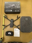 Holy Stone HS720G 2-AXIS Foldable Camera Drone. Fixed Price $125.00.
