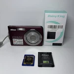 Nikon Coolpix S210 8.0MP Digital Camera - Plum W/new Charger + 8GB Sd Battery. Fixed Price $89.00.