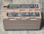 Neewer 7.4V NP-F750 4400MAH Li-ion Replacement Battery With Usb Charging Brown. Fixed Price $29.99.